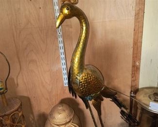 Large brass heron
