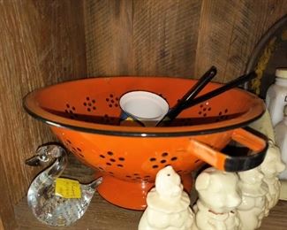 Orange enamel colander