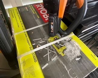 new in box, ryobi table saw with stand