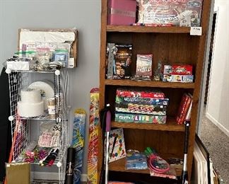 Bookcase; Sewing Supplies; Brother Extension Table Arm for Sewing Machine; Kites; Games; New STL Cardinals Monopoly Game; Monopoly Boutique edition; Easton Bat; Pool Floats