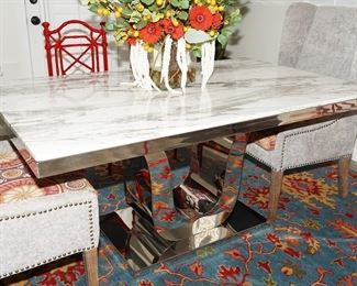 Granite topped chrome dining table-very contemporary!