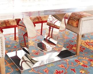Chrome base on the granite topped dining table