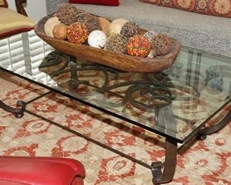 Forged iron glass coffee table in the manner of Gilbert Poillerat