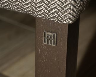 The custom mark of Adriana Hoyos.  This is a piece called the Caramelo chair. 