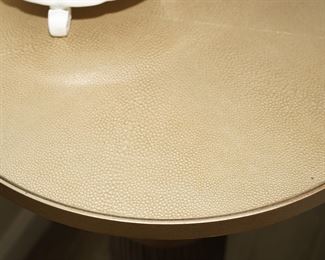 Leather topped golden columnar martini table from LaMaison
