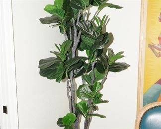 Faux plant in glazed burgundy planter