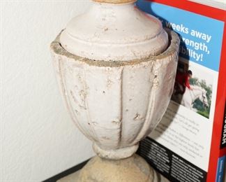 Set of 2 variable height stone lidded urns