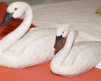Wood carved swans