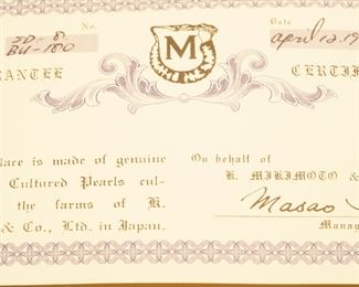 We have all paperwork, including this Certificate of Authenticity and the original box, for the Mikimoto necklace.