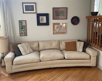 Curved couch on wheels, super comfortable! Measures 100”x35”28”