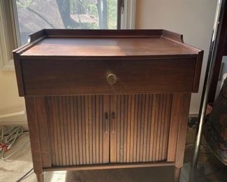 "Richardson Bros Co" end table with sliding doors 