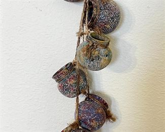 Southwest Dangling Pots	34. Total length.	
