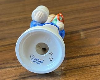 Vintage Hummel Goebel Girl with Flowers and Candleholder No.115	3.75 inches high.	
