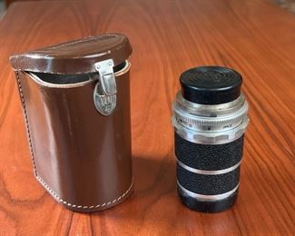 Voigtlander Super-Dynarex 135mm f/4 lens in case	Case: 4.5x2.75x2.75in	HxWxD
