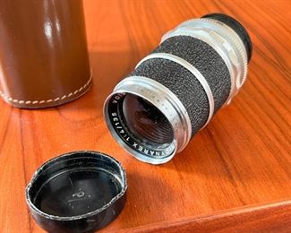 Voigtlander Super-Dynarex 135mm f/4 lens in case	Case: 4.5x2.75x2.75in	HxWxD
