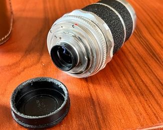 Voigtlander Super-Dynarex 135mm f/4 lens in case	Case: 4.5x2.75x2.75in	HxWxD
