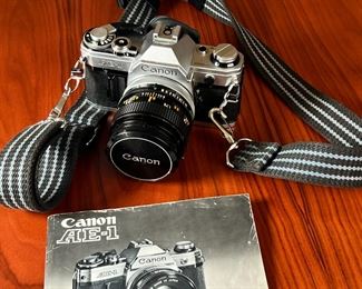 Canon AE-1 35mm Camera with FD 50mm 1.4 Lens		

