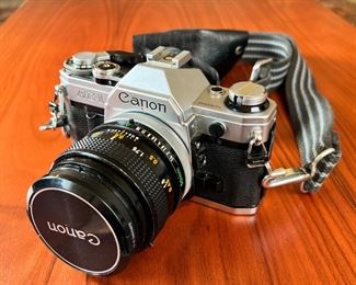 Canon AE-1 35mm Camera with FD 50mm 1.4 Lens		
