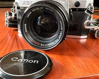 Canon AE-1 35mm Camera with FD 50mm 1.4 Lens		
