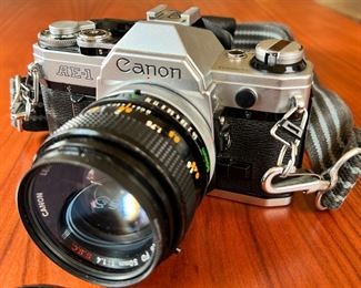 Canon AE-1 35mm Camera with FD 50mm 1.4 Lens		
