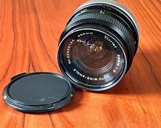 Vivitar 28mm f/2 FD mount Lens	3x2.5in Diameter	
