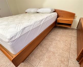 1980s Danish Teak Platform Queen Bed	Frame: 30 x 108 x 85in Mattress:  60 x 80in	HxWxD
