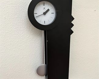 Infinity Modern Pendulum Clock	18.5 x 8 x 2.75in	HxWxD
