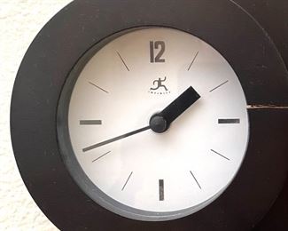 Infinity Modern Pendulum Clock	18.5 x 8 x 2.75in	HxWxD
