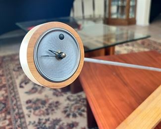 Contemporary balance Table clock	10x2.5x28in	HxWxD
