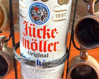 Jücke Möller Stoneware Cups & Decanter on Wroght Iron Stand 		
