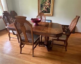 Dining room table with 6 chairs and 2 leaves....