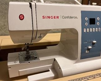 Singer sewing machine and table