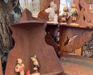 Vintage wood shelves and hummels 