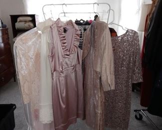 Beautiful evening dresses sizes 8 to 14. Also , gently worn girls christening dress