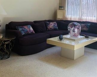 Carter Purple Curved Sectional Sofa, Vintage Lacquer Tiered Pedestal Coffee / Cocktail Table, Peter Bramhall Glass Orb Sculpture