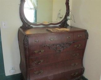 ornate large antique dresser with mirror