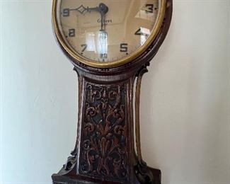 Carved wood wall clock