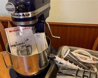 Kitchen aid mixer with a lot of extra attachments