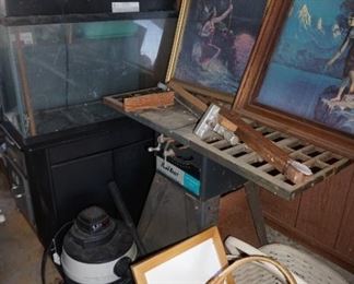 fish tank, shop vac, baskets, wall decor