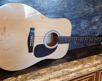 Randy Travis signed guitar.