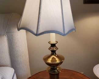 Brass lamp with white shade
31 inches high