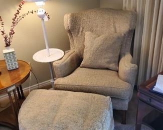 Beige chair with ottoman and pillow
37 inches high