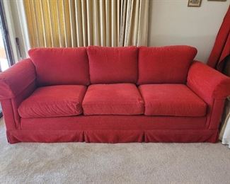 Red couch
86 inches long