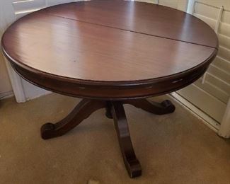 Wooden round table
47 inches round