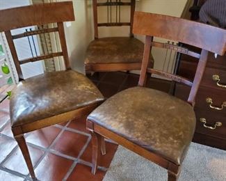 3 wooden brown chairs with faux-leather
33 inches high