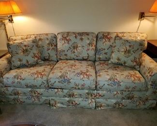 Light green couch with pull out bed
86 inches long