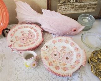 8 plates with matching creamer