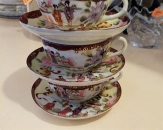 Hand painted tea cups and saucers