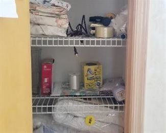 Bedding, towels and household cleaning supplies