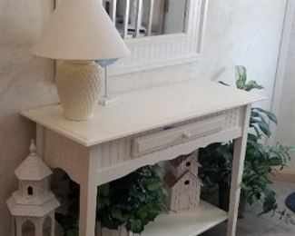 Foyer table with birdhouse decor